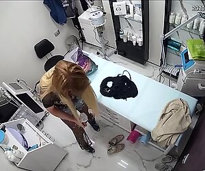 In a beauty salon, she measures underwear